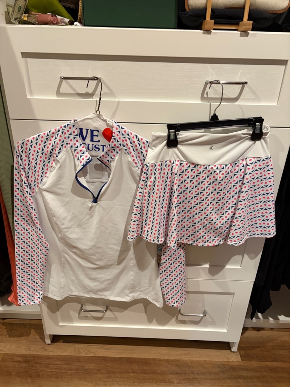 Kyodan quarter zip Top with Pink & Blue Geo Print Golf Skirt